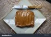 stock-photo-peanut-butter-spread-on-bread-with-spatula-on-white-plate-38059732.jpg